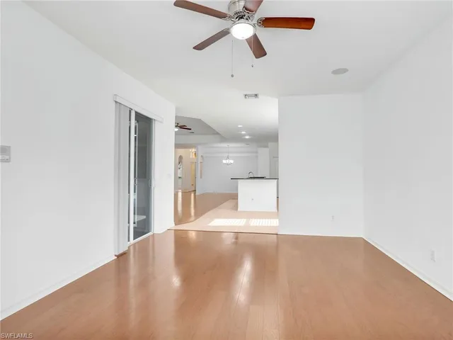 a view of an empty room and window