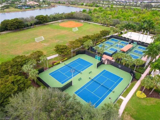 an aerial view of a pool patio swimming pool and outdoor seating