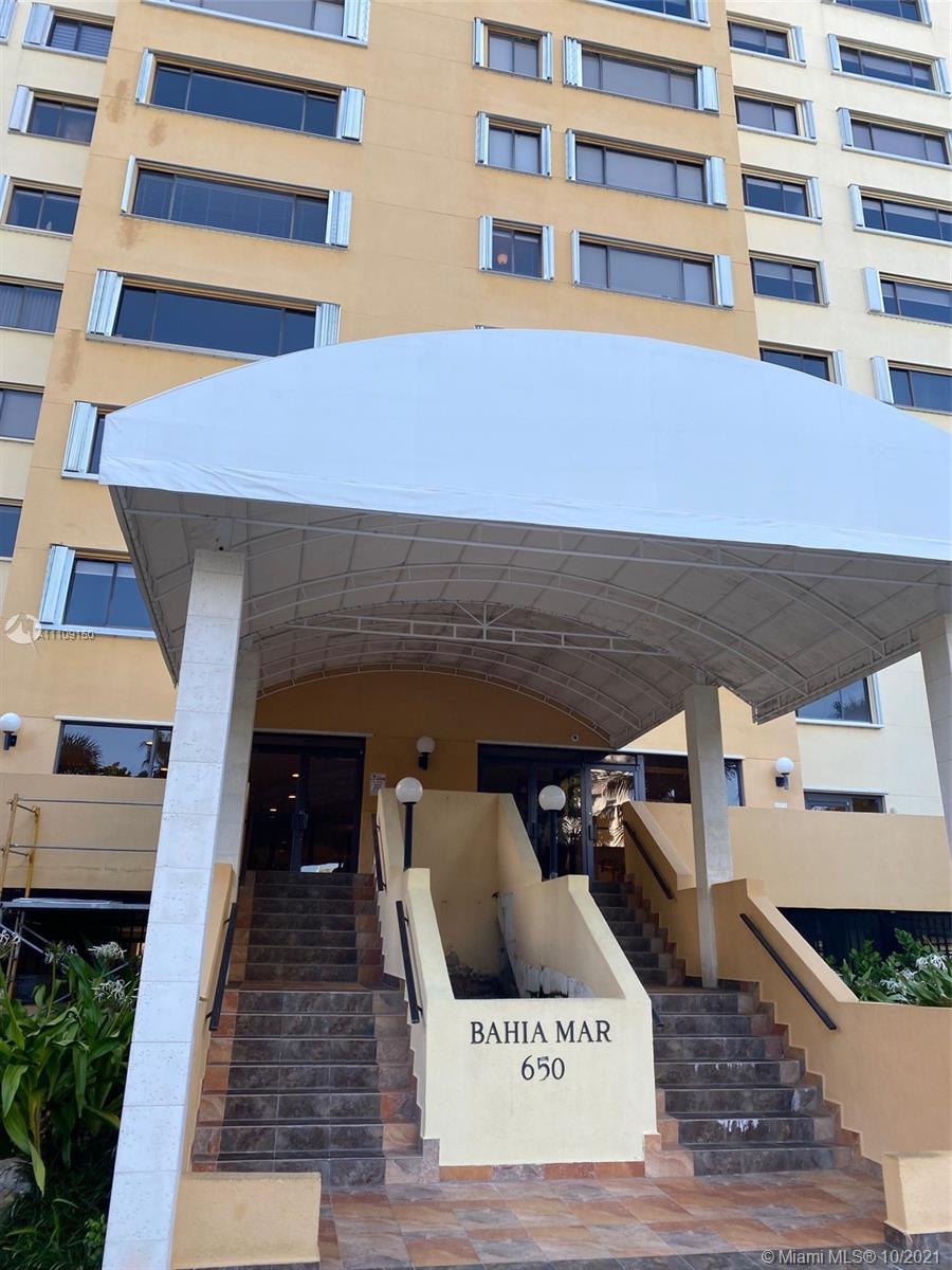 650 Ocean Drive, Unit 9E Key Biscayne, FL 33149 - Photo 4 of 5 a view of a building with outdoor space