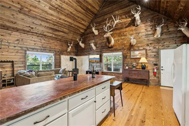 a very nice looking kitchen with a large window