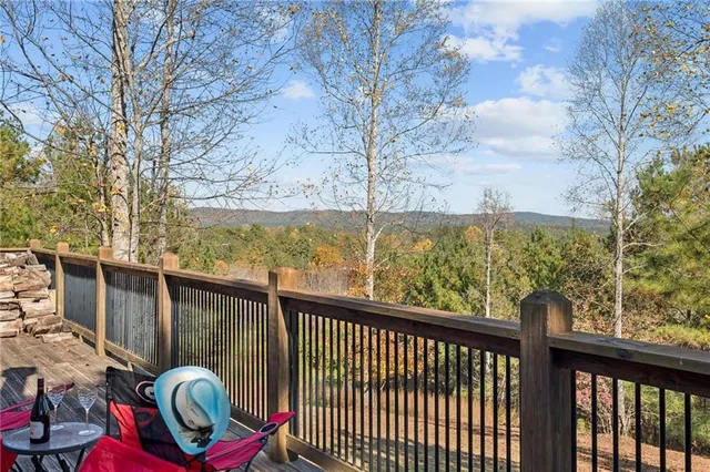 a view of a city with lush green forest