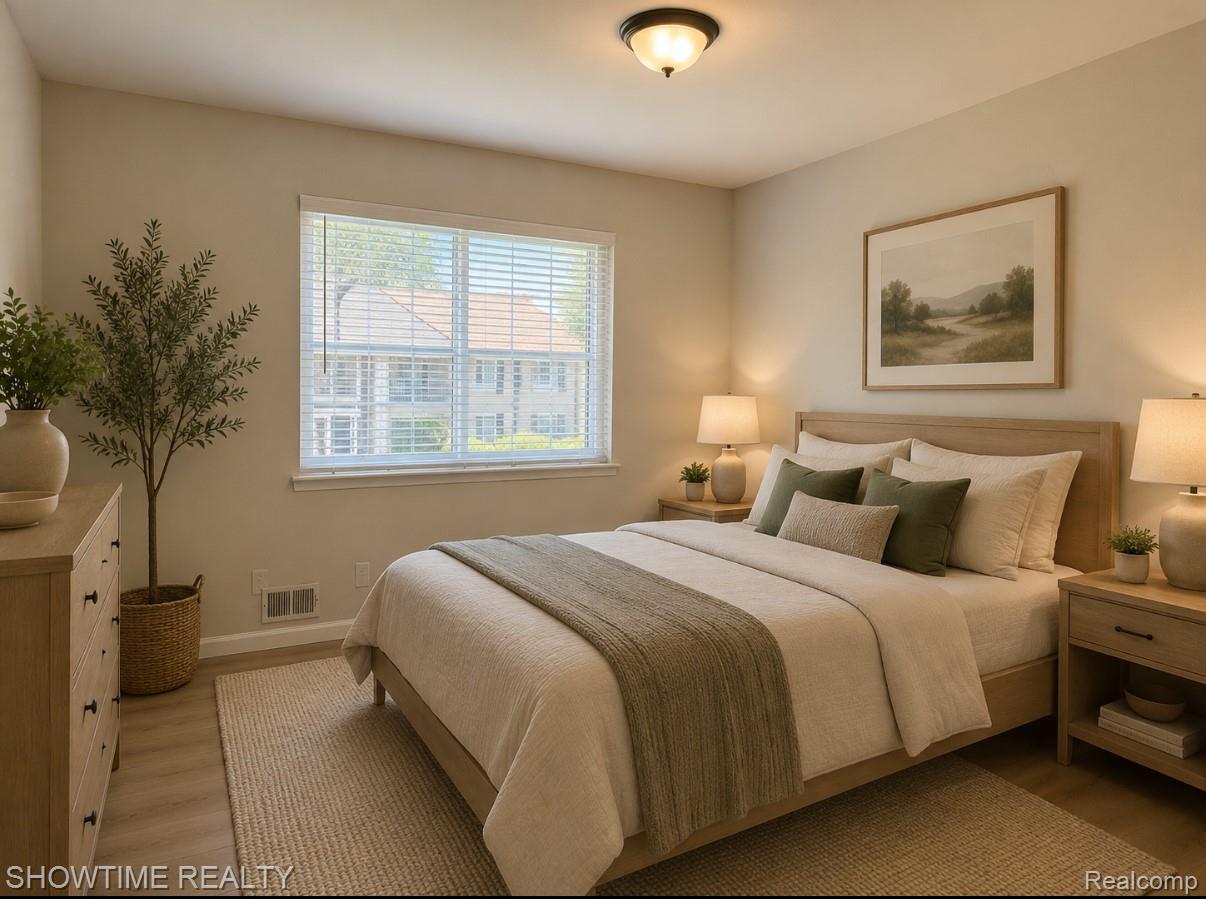 29141 Hayes Road Warren, MI 48088 - Photo 10 of 18 Recessed lighting fixture, light wood-finish flooring, and a large window with blinds