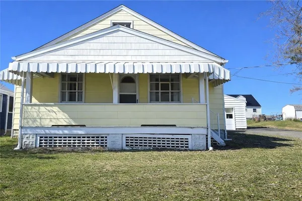a view of a house with a large window