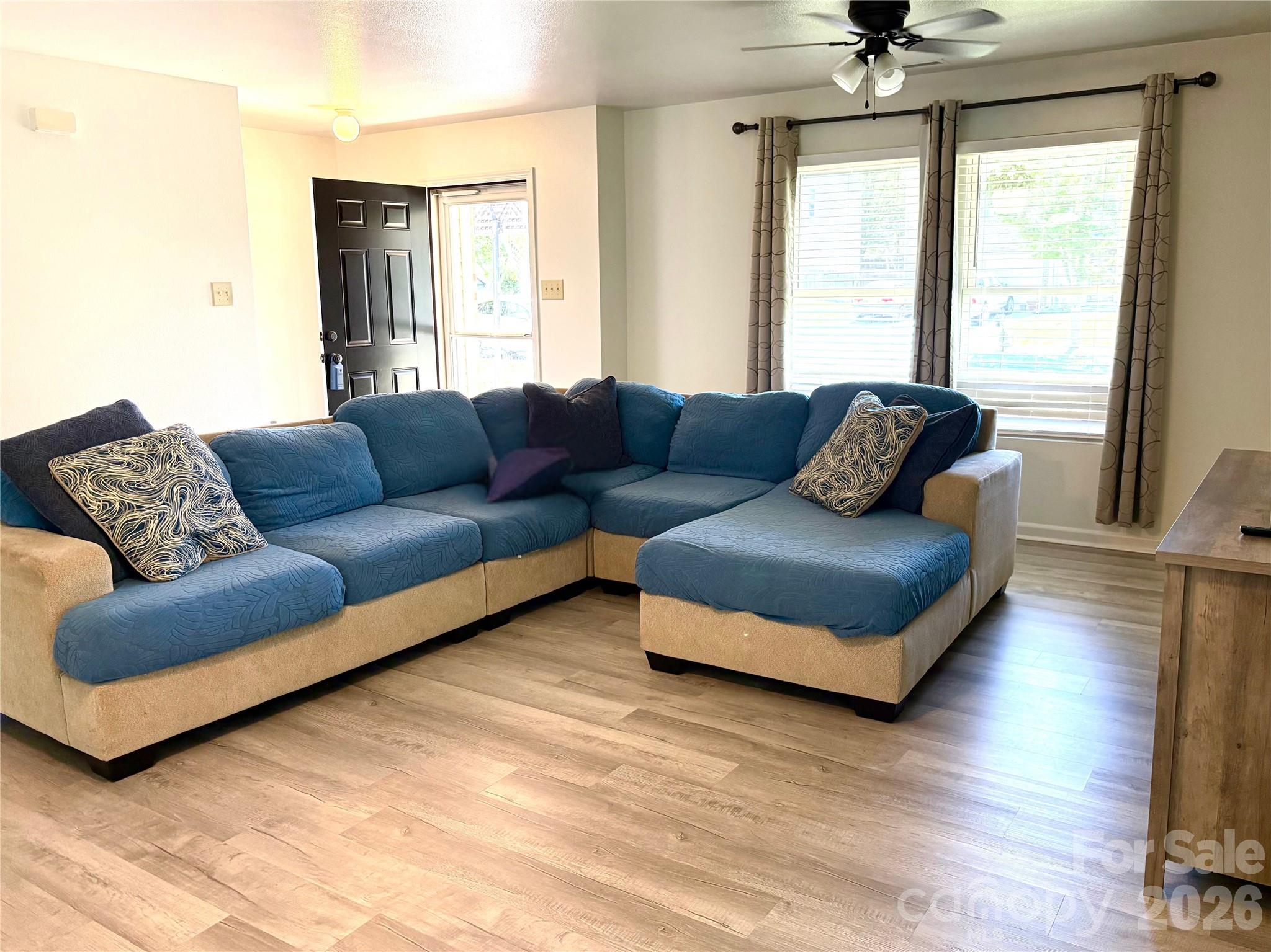 2514 Spring Breeze Way Monroe, NC 28110 - Photo 6 of 25 a living room with furniture and a window