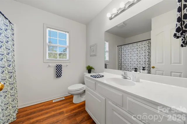 a front view of a house with a yard and porch