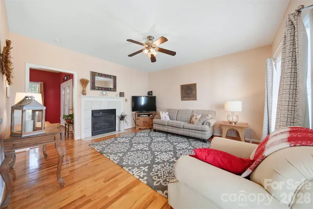 a kitchen with stainless steel appliances granite countertop a sink stove and wooden cabinets
