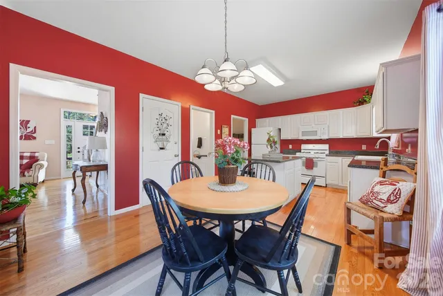 a bedroom with a bed and a mirror