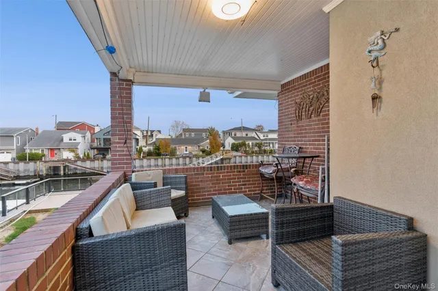 a outdoor sitting area with furniture