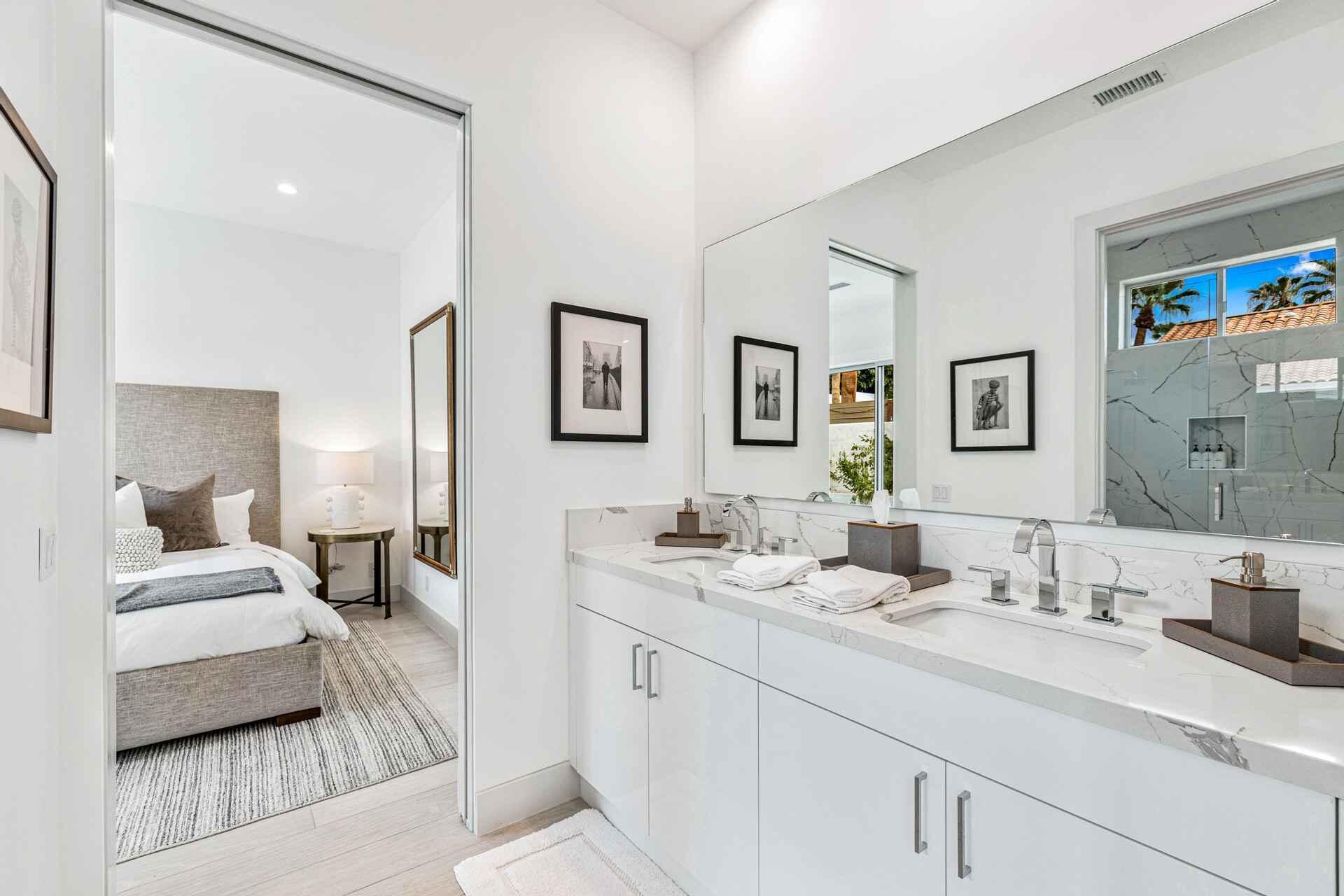 72985 Somera Road, Unit SHARE B Palm Desert, CA 92260 - Photo 13 of 17 a en suite bathroom with double sink and a mirror