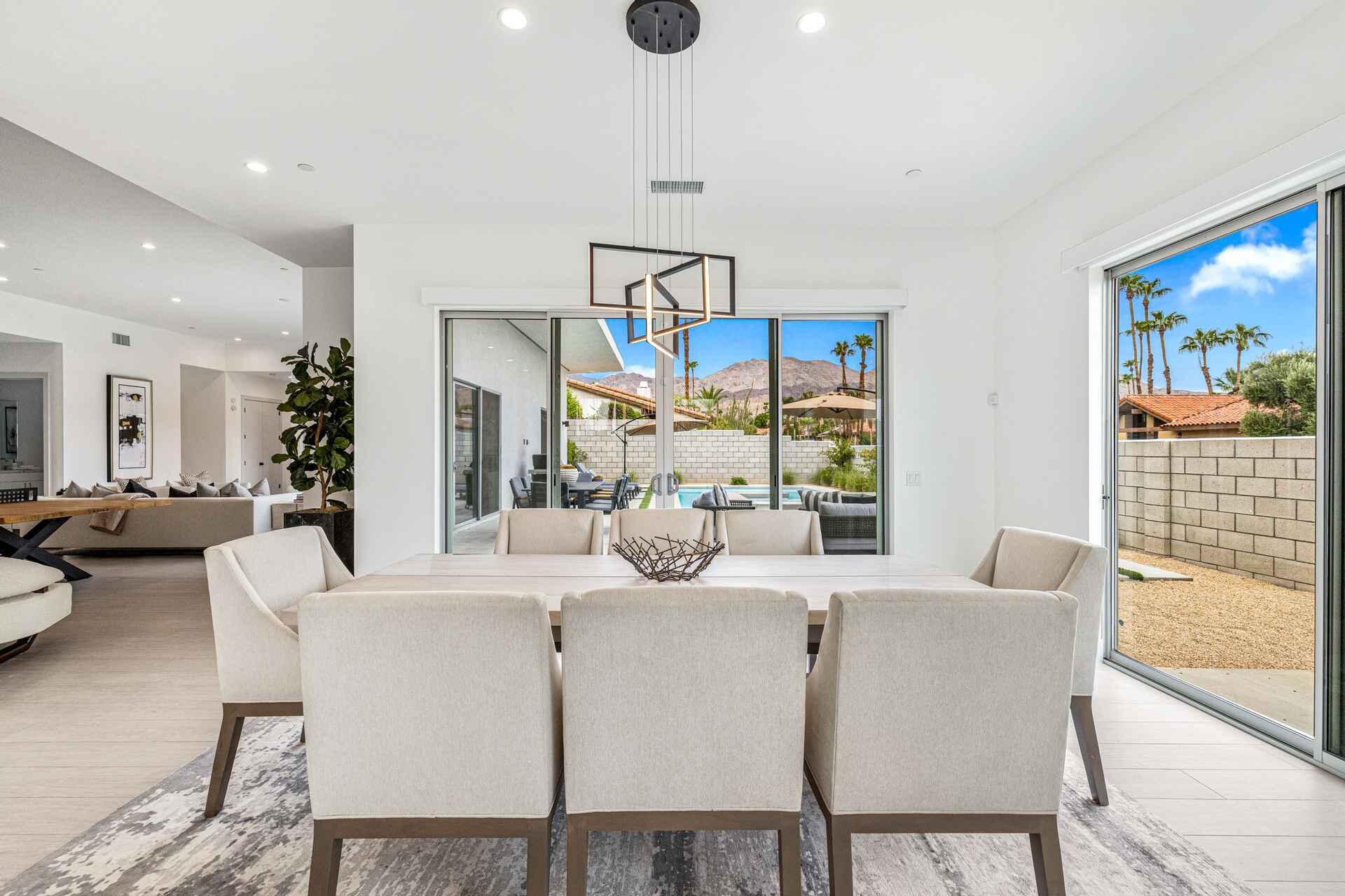72985 Somera Road, Unit SHARE B Palm Desert, CA 92260 - Photo 7 of 17 a dining room with furniture and wooden floor