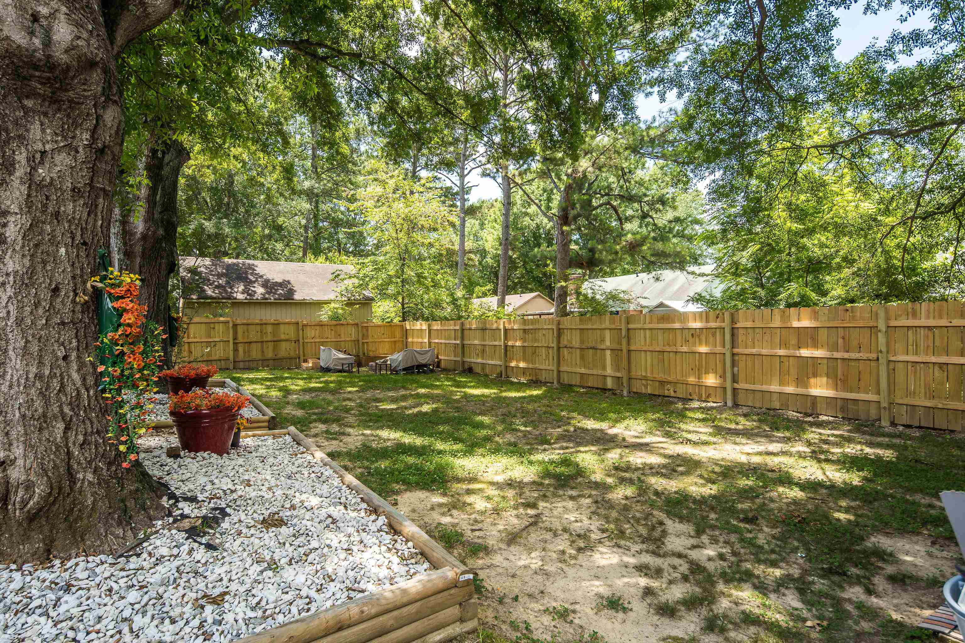 1137 Greenview Road Collierville, TN 38017 - Photo 29 of 35 a view of a yard with a slide