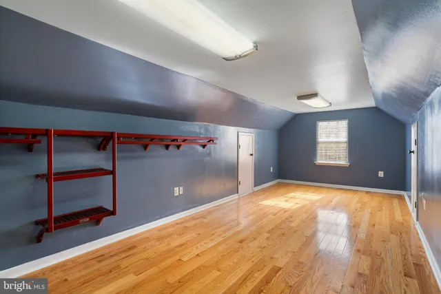 a view of an empty room with a bathroom