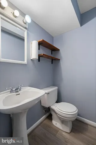 a view of a porch with wooden floor