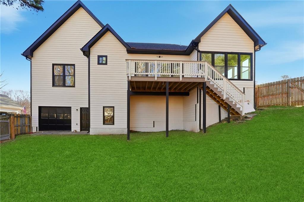 2152 Paces Vale Place Lawrenceville, GA 30043 - Photo 12 of 39 a view of a house with a yard and front view of house