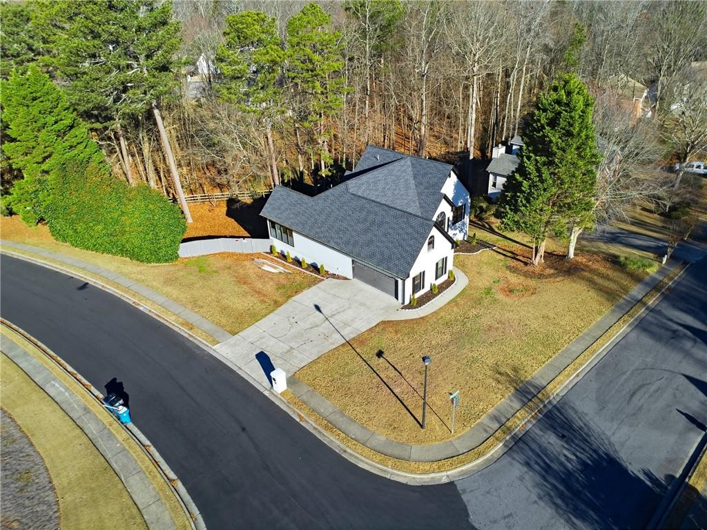 2152 Paces Vale Place Lawrenceville, GA 30043 - Photo 13 of 39 an aerial view of a house with a swimming pool