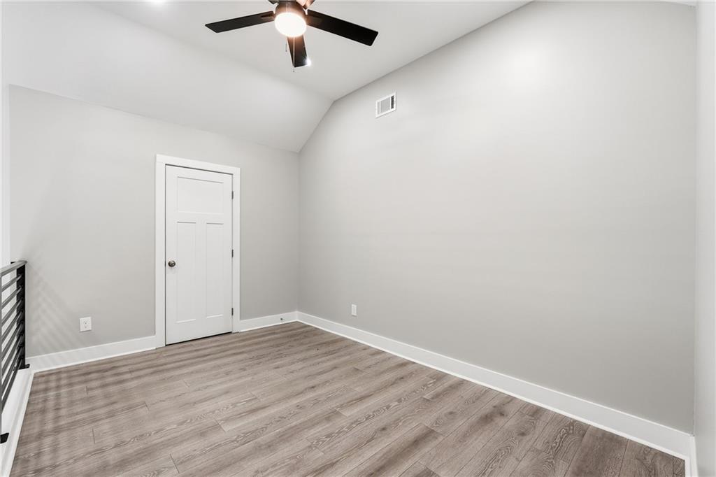 2152 Paces Vale Place Lawrenceville, GA 30043 - Photo 25 of 39 wooden floor in an empty room