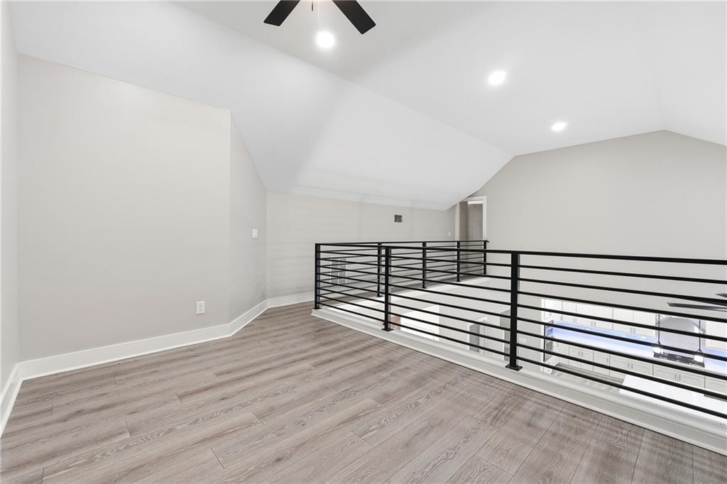2152 Paces Vale Place Lawrenceville, GA 30043 - Photo 26 of 39 a view of a room with wooden floor