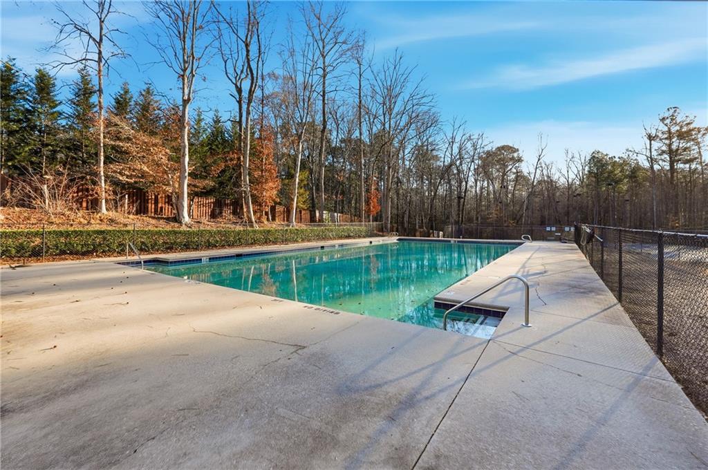 2152 Paces Vale Place Lawrenceville, GA 30043 - Photo 27 of 39 a view of a park with large trees