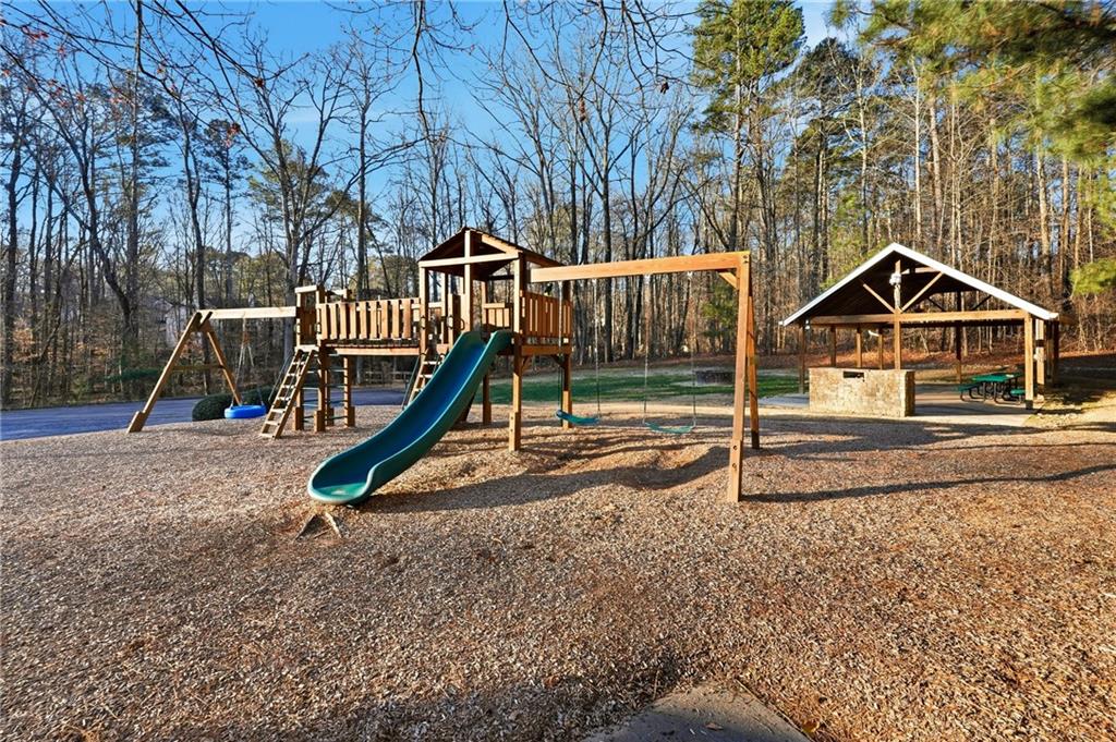 2152 Paces Vale Place Lawrenceville, GA 30043 - Photo 30 of 39 a view of a house with a park