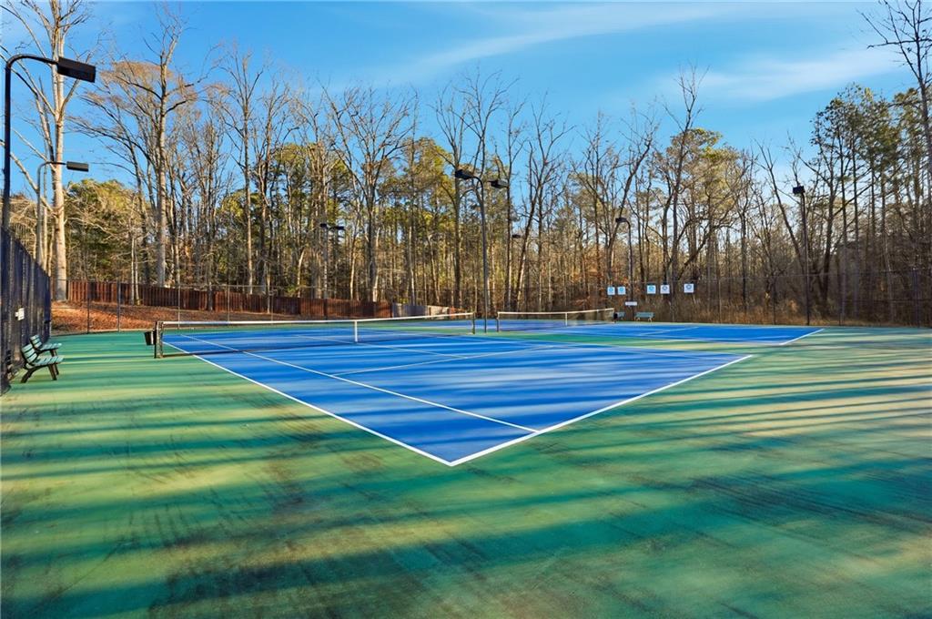 2152 Paces Vale Place Lawrenceville, GA 30043 - Photo 33 of 39 a view of a tennis court