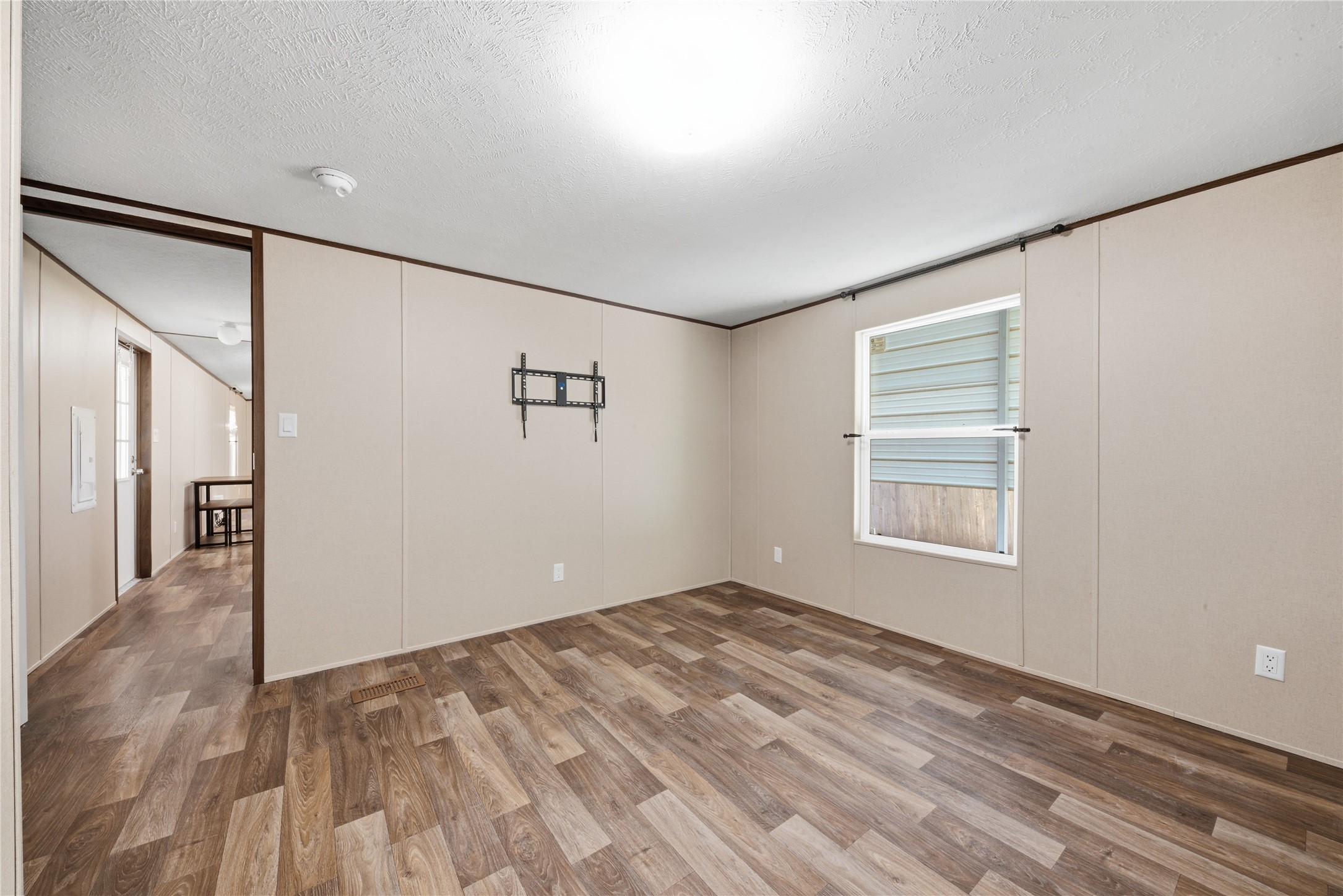 100 St Croix Drive Point Blank, TX 77364 - Photo 12 of 28 a view of empty room with wooden floor and fan