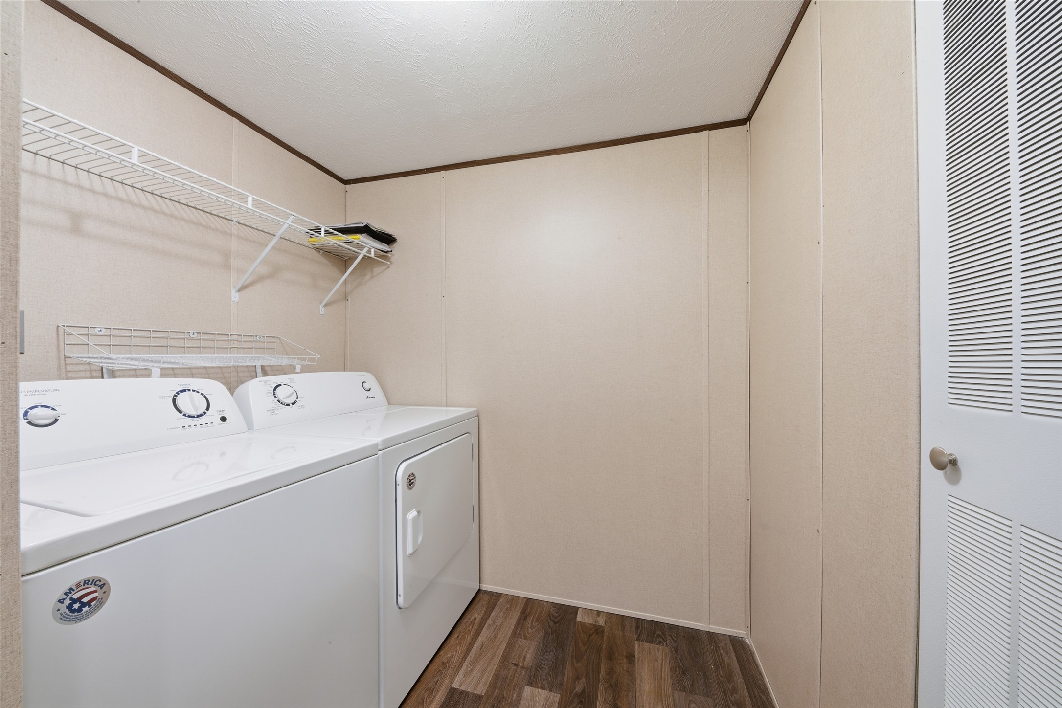 100 St Croix Drive Point Blank, TX 77364 - Photo 16 of 28 a view of a storage & utility room with dryer and washer
