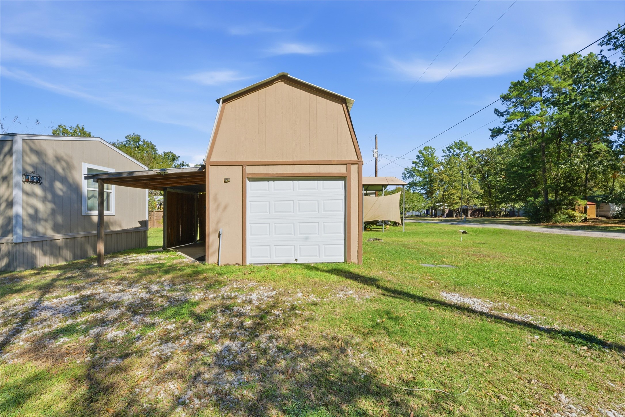 100 St Croix Drive Point Blank, TX 77364 - Photo 19 of 28 a view of a house with a yard
