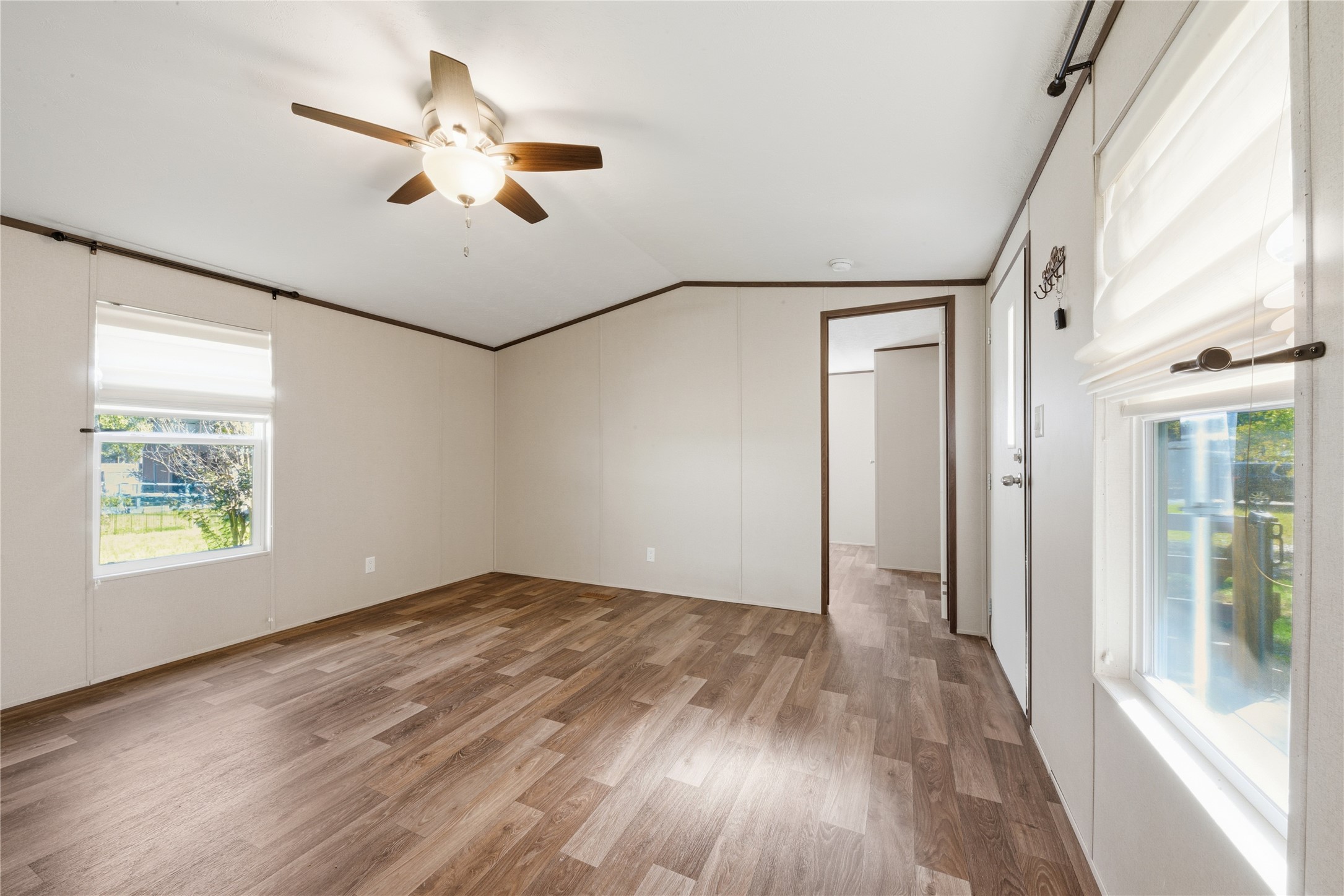 100 St Croix Drive Point Blank, TX 77364 - Photo 8 of 28 wooden floor in an empty room with a window