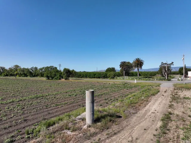 a view of lake with green space