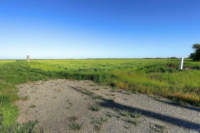 a view of a beach with a yard