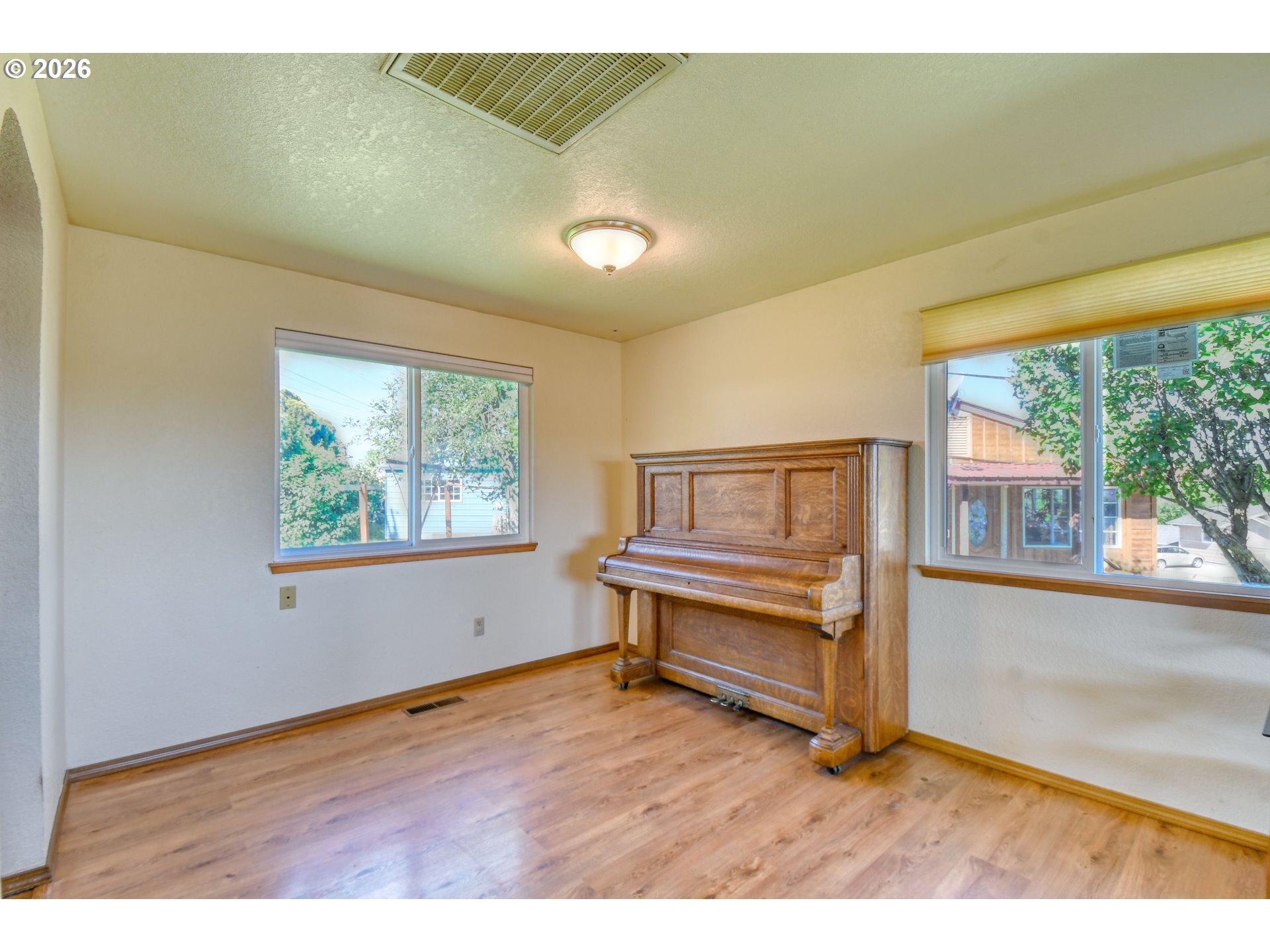 1107 Southwest 23rd Street Pendleton, OR 97801 - Photo 11 of 42 a view of room with window and wooden floor
