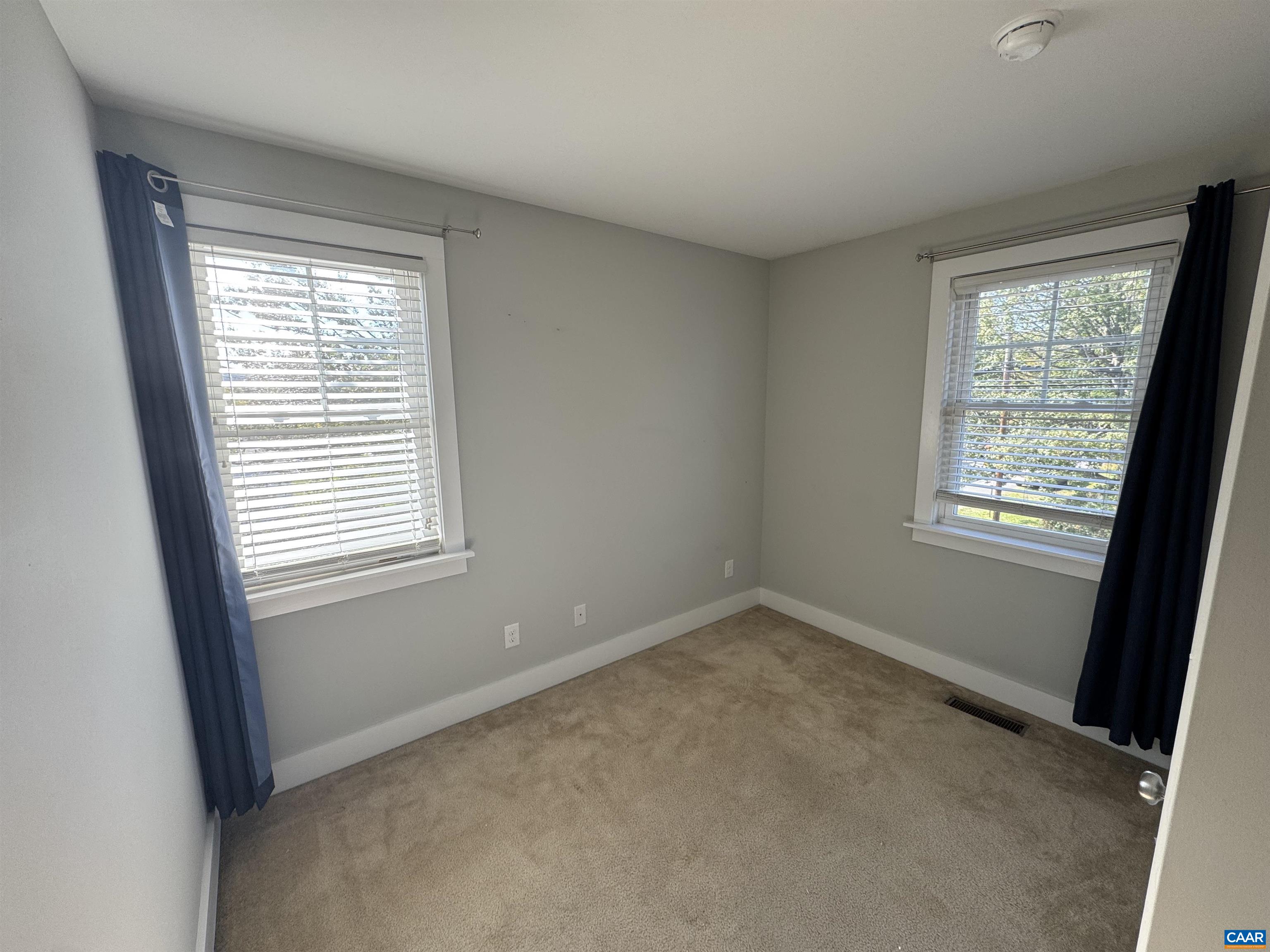 516 Rives Street Charlottesville, VA 22902 - Photo 14 of 26 a view of an empty room with a window