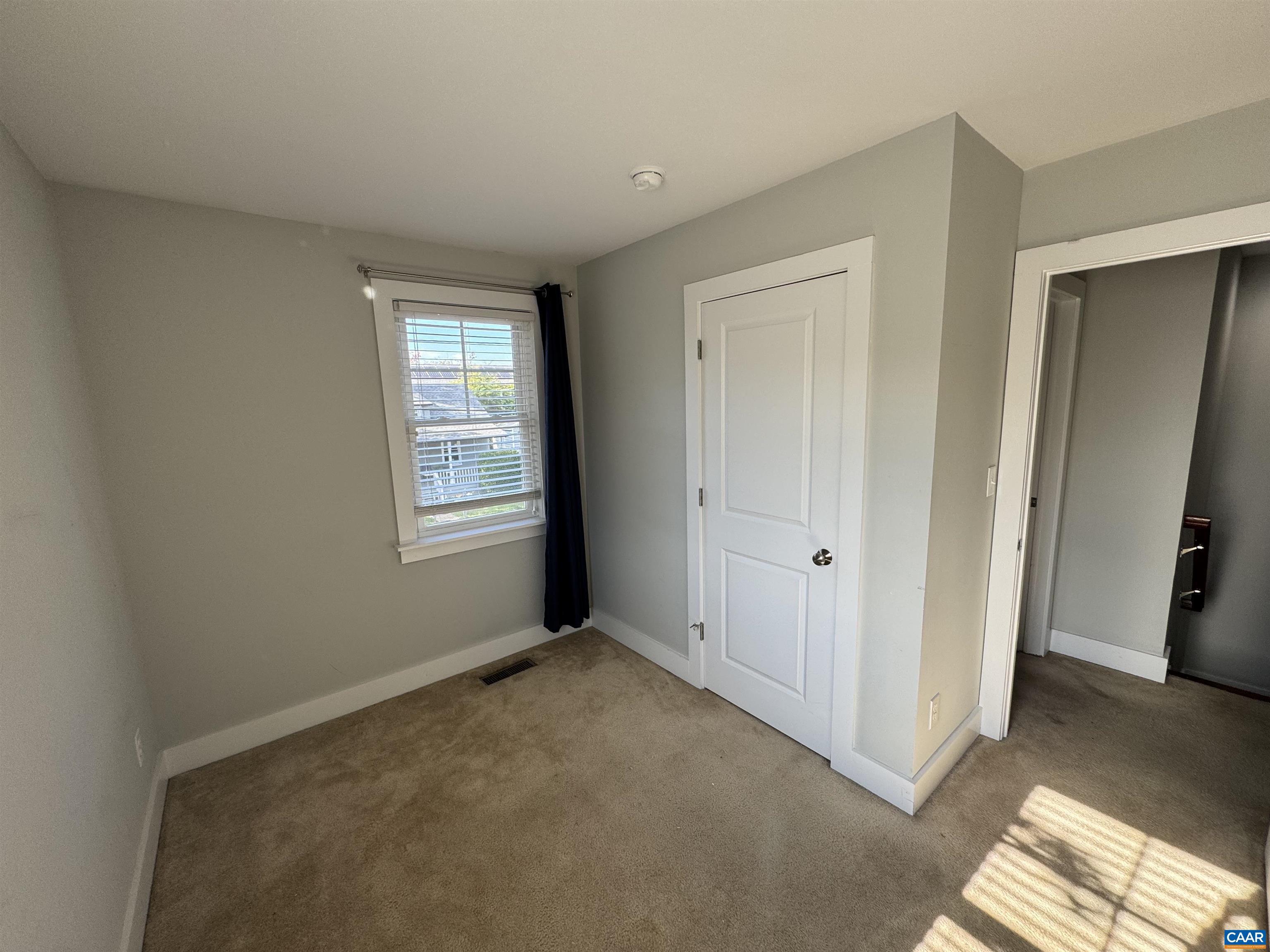 516 Rives Street Charlottesville, VA 22902 - Photo 15 of 26 a view of an empty room with a window