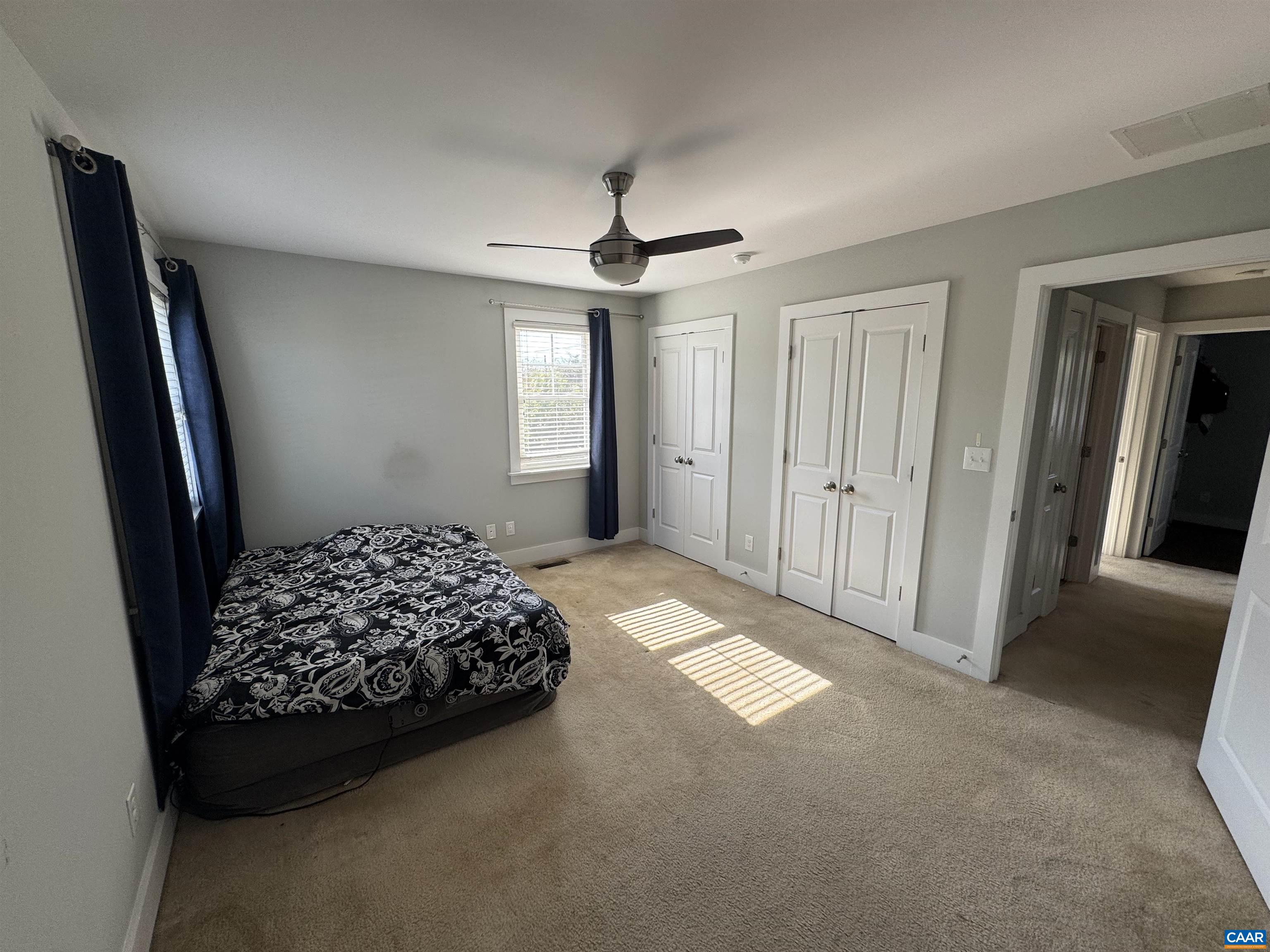 516 Rives Street Charlottesville, VA 22902 - Photo 20 of 26 a bedroom with a bed and a window