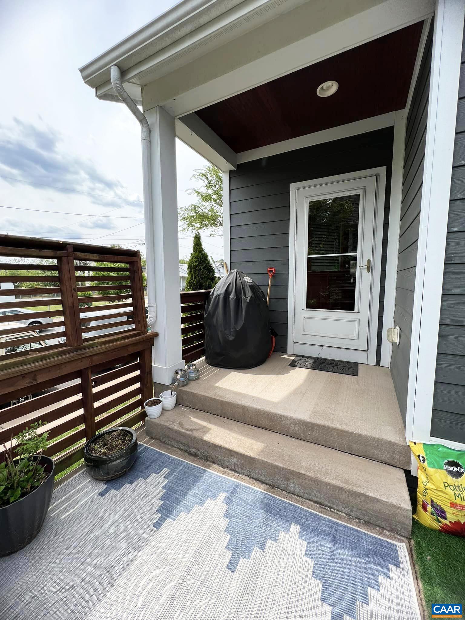 516 Rives Street Charlottesville, VA 22902 - Photo 23 of 26 a front view of a house with a garden
