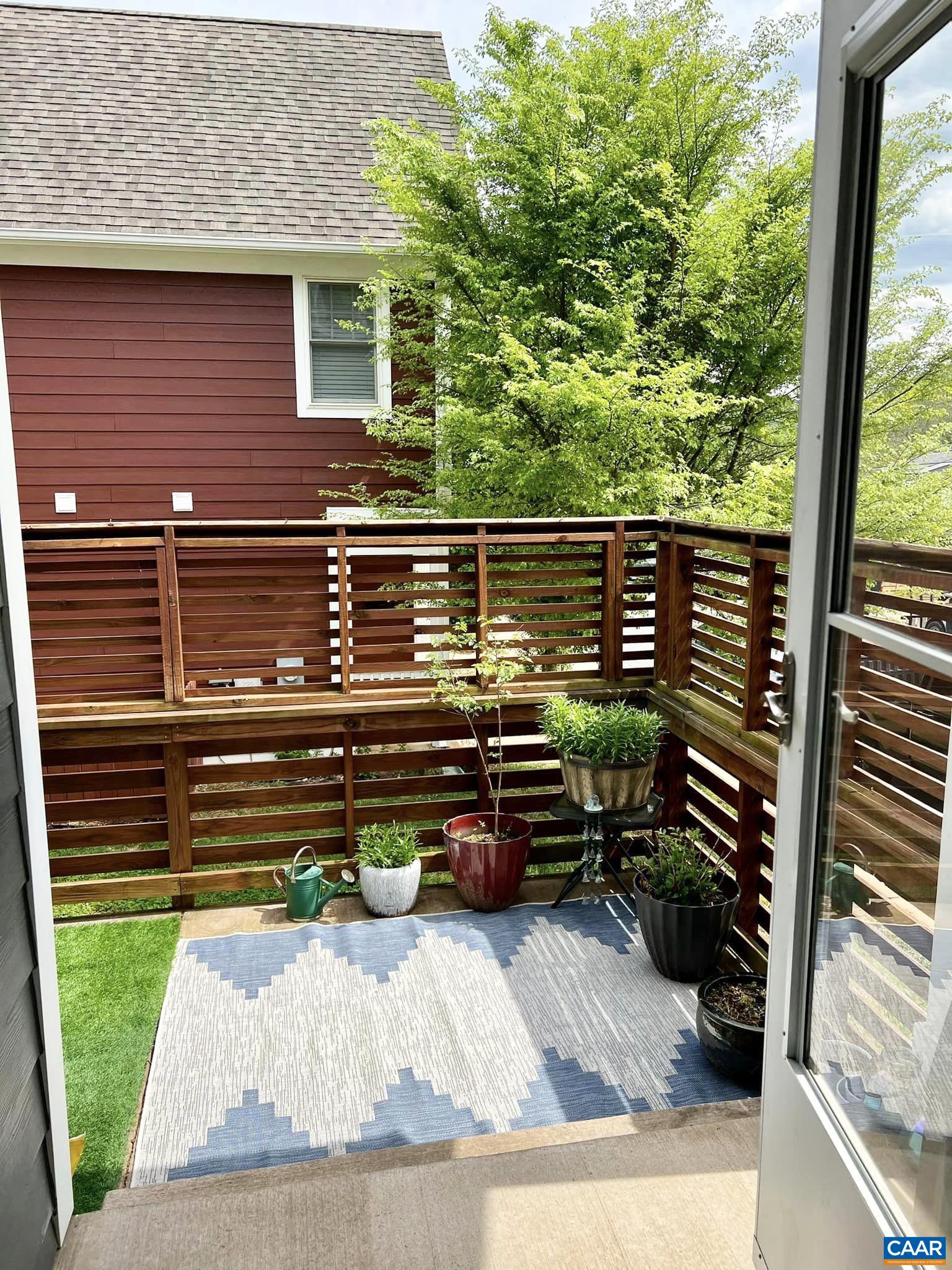 516 Rives Street Charlottesville, VA 22902 - Photo 24 of 26 a view of a wooden deck with a bench