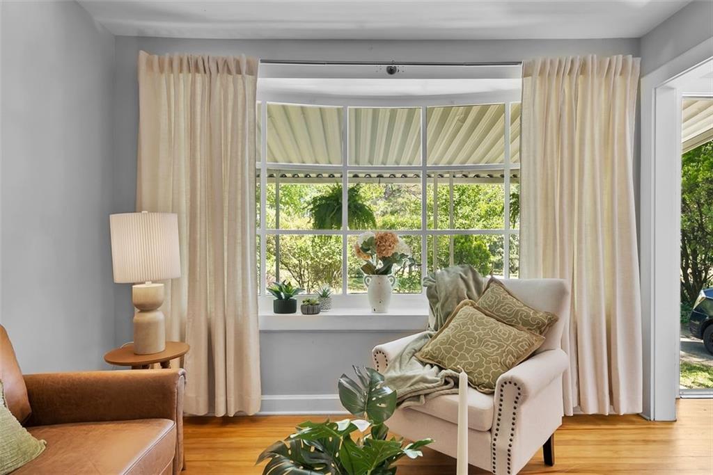 2218 East Street Covington, GA 30014 - Photo 11 of 38 a living room with furniture and a window