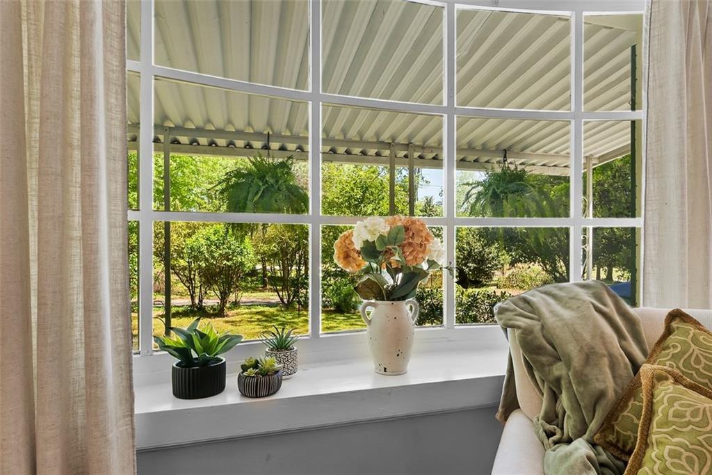 2218 East Street Covington, GA 30014 - Photo 12 of 38 a view of a dining room with furniture window and outside view