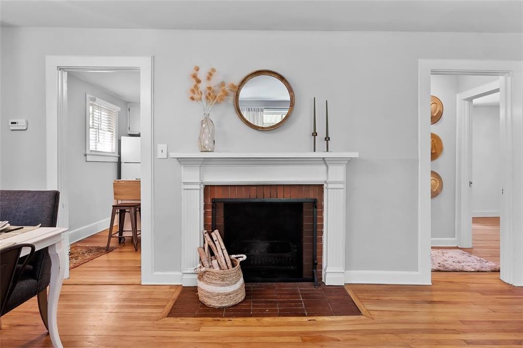 2218 East Street Covington, GA 30014 - Photo 15 of 38 a living room with furniture and a fireplace