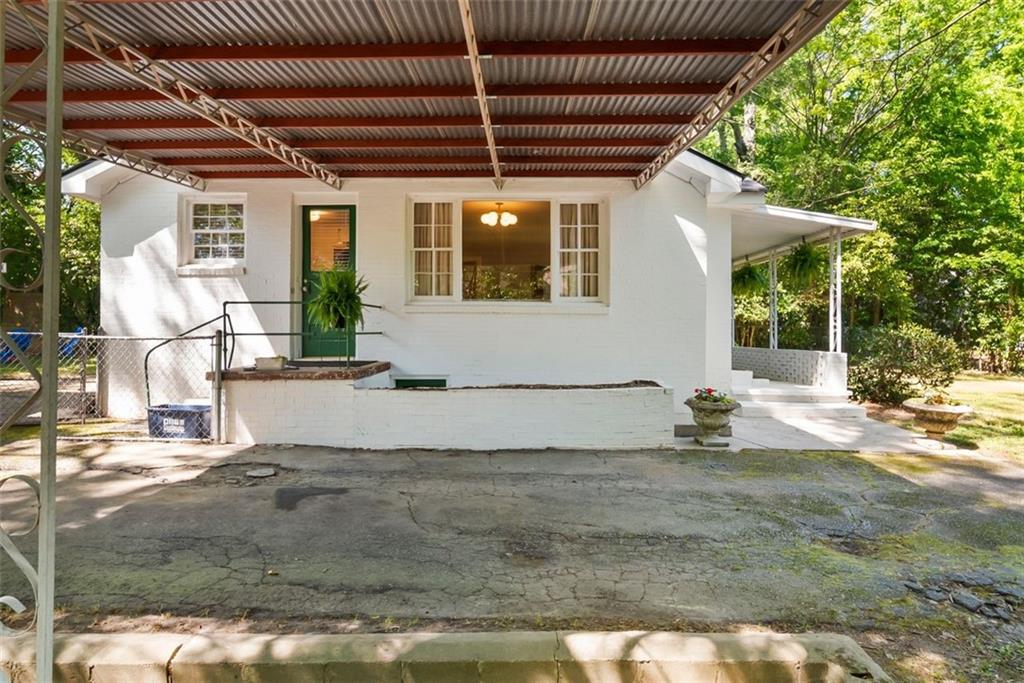 2218 East Street Covington, GA 30014 - Photo 30 of 38 a view of a house with a patio