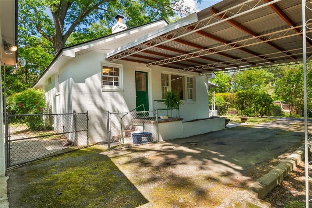 2218 East Street Covington, GA 30014 - Photo 31 of 38 a view of a house with backyard