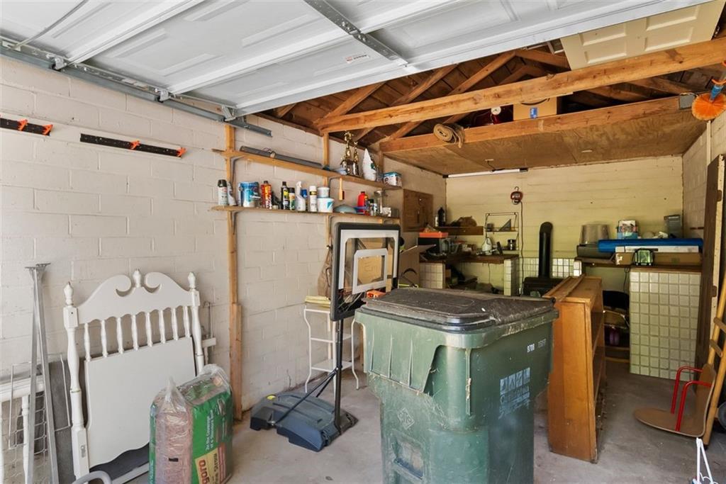 2218 East Street Covington, GA 30014 - Photo 35 of 38 a utility room with dryer and washer