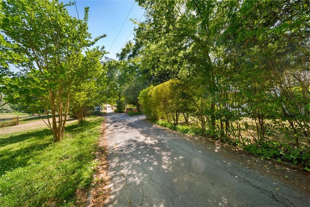 2218 East Street Covington, GA 30014 - Photo 37 of 38 a pathway of a yard