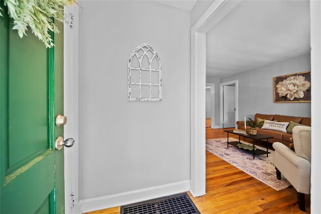 2218 East Street Covington, GA 30014 - Photo 6 of 38 a view of a livingroom with furniture and a window