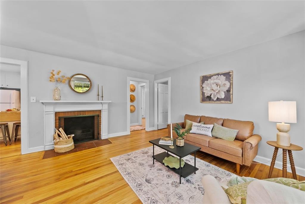 2218 East Street Covington, GA 30014 - Photo 7 of 38 a living room with furniture and a fireplace