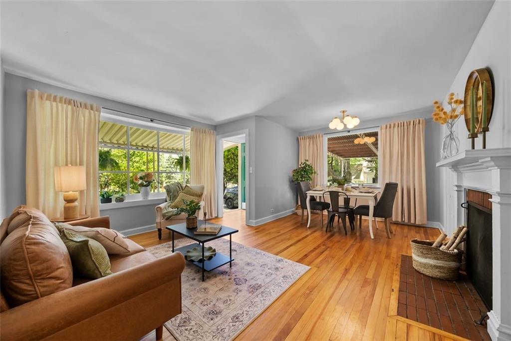 2218 East Street Covington, GA 30014 - Photo 8 of 38 a living room with fireplace furniture and a wooden floor