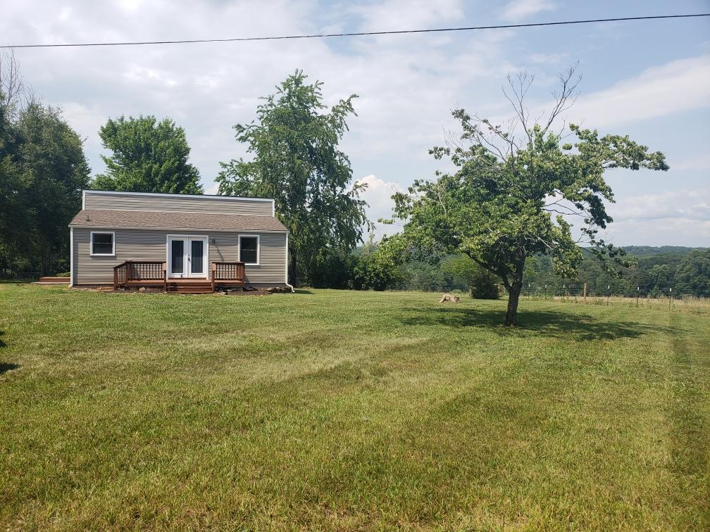 803 Mallard Point Road Wirtz, VA 24184 - Photo 2 of 10 a view of a house with a yard