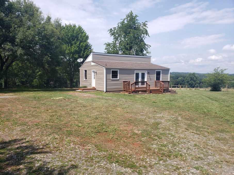 803 Mallard Point Road Wirtz, VA 24184 - Photo 3 of 10 a house view with a garden space