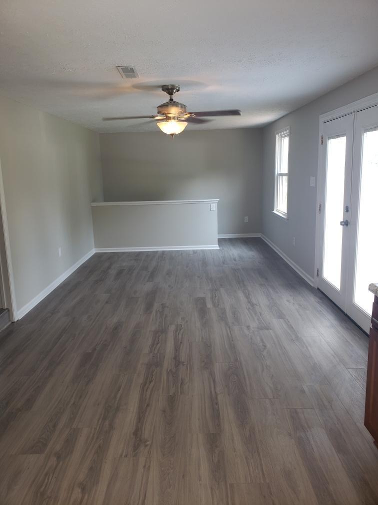 803 Mallard Point Road Wirtz, VA 24184 - Photo 4 of 10 a view of empty room with wooden floor and fan