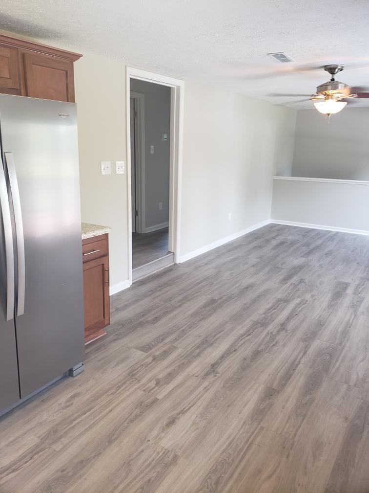 803 Mallard Point Road Wirtz, VA 24184 - Photo 8 of 10 a view of a kitchen with wooden floor and staircase